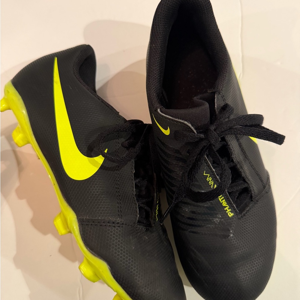 Nike Black Youth Soccer Cleats with Bright Yellow Swoosh
